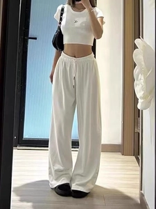 Women's white casual two-piece set featuring cropped T-shirt and drawstring wide-leg pants