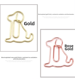 Detail of dog shaped paper clips in gold and rose gold with anti-oxidation plating