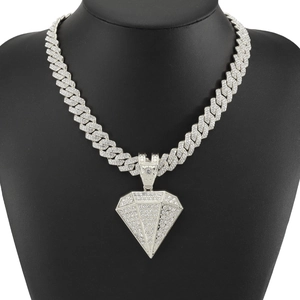 Silver iced out pyramid pendant necklace with Cuban chain and sparkling rhinestones