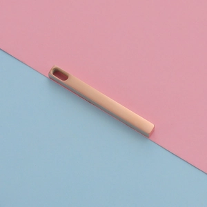 Macro detail of a rose gold rectangle bar pendant with a polished finish and top hole