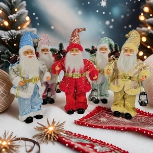 Standing Santa Claus figurines in colorful sparkling outfits for Christmas window decor