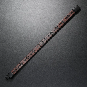 Detail of brown leather multi-layer bracelet with black cross print and magnetic clasp