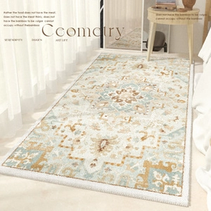 Detailed close-up of French vintage rug with geometric medallion pattern and plush edges