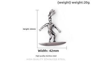 Macro shot of surfer pendant in stainless steel with 60mm height and 42mm width specs