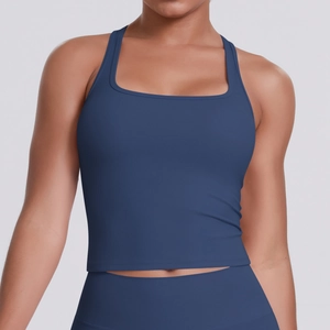 Detail of navy blue racerback sports vest with square neckline and moisture-wicking fabric