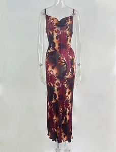 Close-up of elegant cowl neck and pleated vintage floral print on a long sleeveless dress