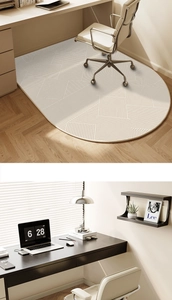 Macro view of oval TPR office chair mat featuring beige geometric stripe patterns