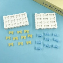 Silicone mold for mini bowknots with yellow and blue finished resin samples