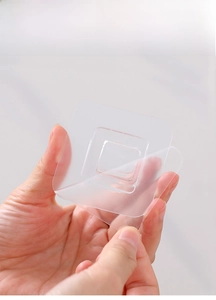 Gancio da parete adesivo trasparente in plastica flessibile con presa forte