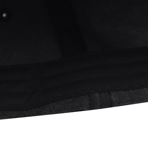 Close-up of reinforced multi-row stitching on the inner sweatband of a black baseball cap