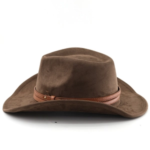 Detailed macro view of dark brown suede fedora featuring a leather band and metal rivets