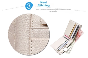 Close-up of beige lychee grain leather wallet showing stitching and multi-slot interior