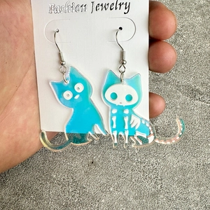 Halloween cat earrings in blue acrylic with skeleton pattern and punk style