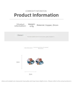 Detailed view of copper and silver stud earrings with colorful cubic zirconia stones