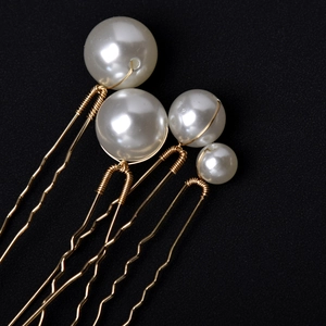 Set of 4 elegant pearl hair pins with gold wire wrapping for bridal wedding hairstyles