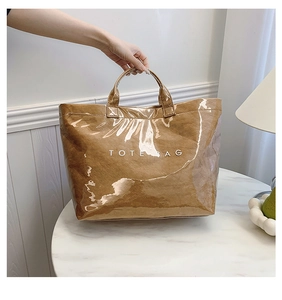 Detail of Tyvek tote bag with transparent PVC outer layer and TOTE BAG print