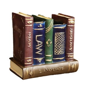 Vintage resin book stack organizer and pen holder with gold embossed details