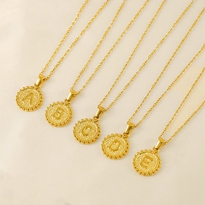 18k gold plated stainless steel initial necklaces with five circular letter pendants on silk