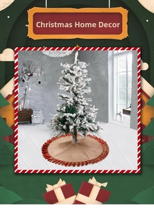 Close-up of linen Christmas tree skirt featuring a red plaid ruffle edge and holiday decor