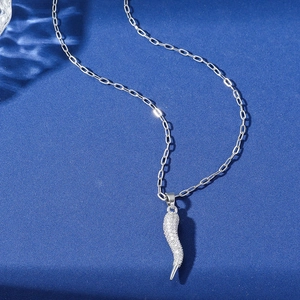 Silver 18k gold plated necklace featuring a horn pendant with pavé white crystals