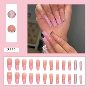 French gradient glitter press-on nails with rhinestones in long ballerina shape