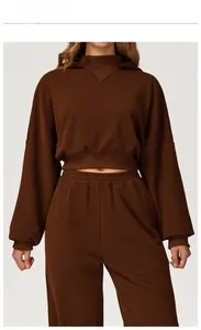 Caramel brown hooded sweatshirt and jogger pants set featuring ribbed cuffs and soft fabric