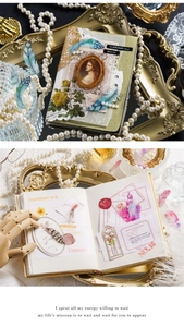 Macro view of vintage feather PET stickers and collage materials for DIY journaling