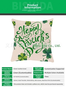 Linen pillowcase detail showing green clover motifs and St. Patrick's Day embroidery