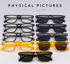 Flat lay of retro square sunglasses collection in diverse colors and textures