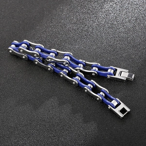 Close-up of men's stainless steel bicycle chain bracelet in silver and blue finish