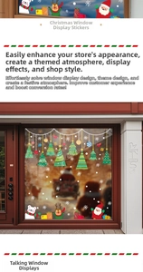 Detail of Christmas window stickers featuring Santa, reindeer, and snowflakes on glass