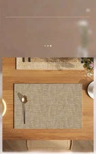 Macro shot of faux linen texture on waterproof leather dish drying mat on wooden table