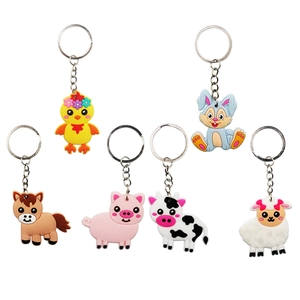 Detailed view of six colorful cartoon animal acrylic keychains with metal rings