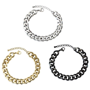 Three Cuban link bracelets in silver, gold, and black with lobster clasps and extension chains