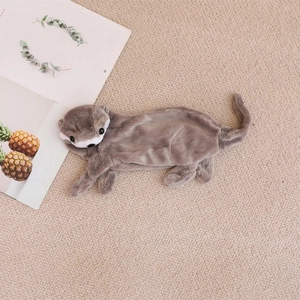 Plush otter pencil case in grey faux fur with cute facial features on a woven background