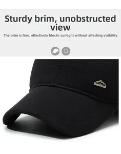 Detail of the high-quality twill fabric and mountain metal logo on this black sports cap