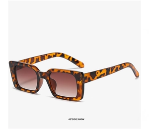 Detail view of square leopard print sunglasses at a 45-degree angle side show