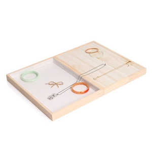 Minimalist solid wood jewelry display tray with velvet lining for rings and bracelets