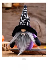 Macro detail of Halloween gnome with knit spider hat, purple plush body and fangs