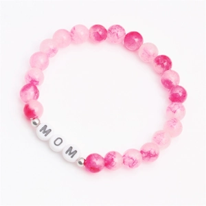 Pink stone beaded MOM bracelet with silver spacers for Mother's Day gift on white background