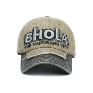 Detail of vintage washed canvas baseball cap with 3D BHOLA embroidery and distressed edges
