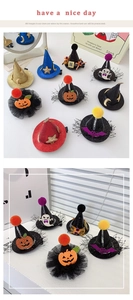 Detail showing glittery mini wizard hats with pumpkins and ghosts for Halloween