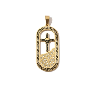 Detailed view of golden skull cross pendant with crystals and Greek key pattern edges