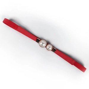 Elegant red elastic waist belt featuring a decorative large pearl gold metal buckle