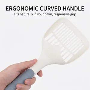 Ergonomic large cat litter scooper with gray non-slip handle and white slotted shovel head