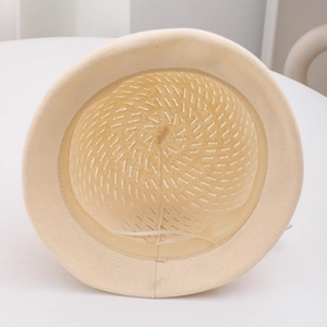 Detailed interior of a woven sun hat showing breathable mesh and adjustable drawstrings