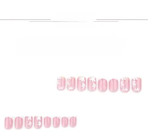 Detailed view of press-on nails with white French tips and floral patterns on nude base