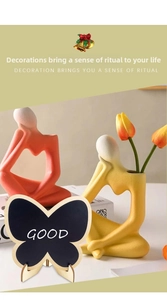 Butterfly-shaped mini chalkboard sign on wooden stand for table decoration