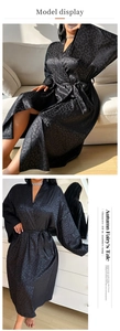 Detail of black leopard jacquard satin robe with waist tie and wide cuffs