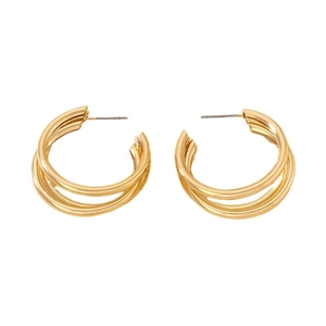 Retro triple-layered geometric gold hoop earrings with polished metal finish on white back